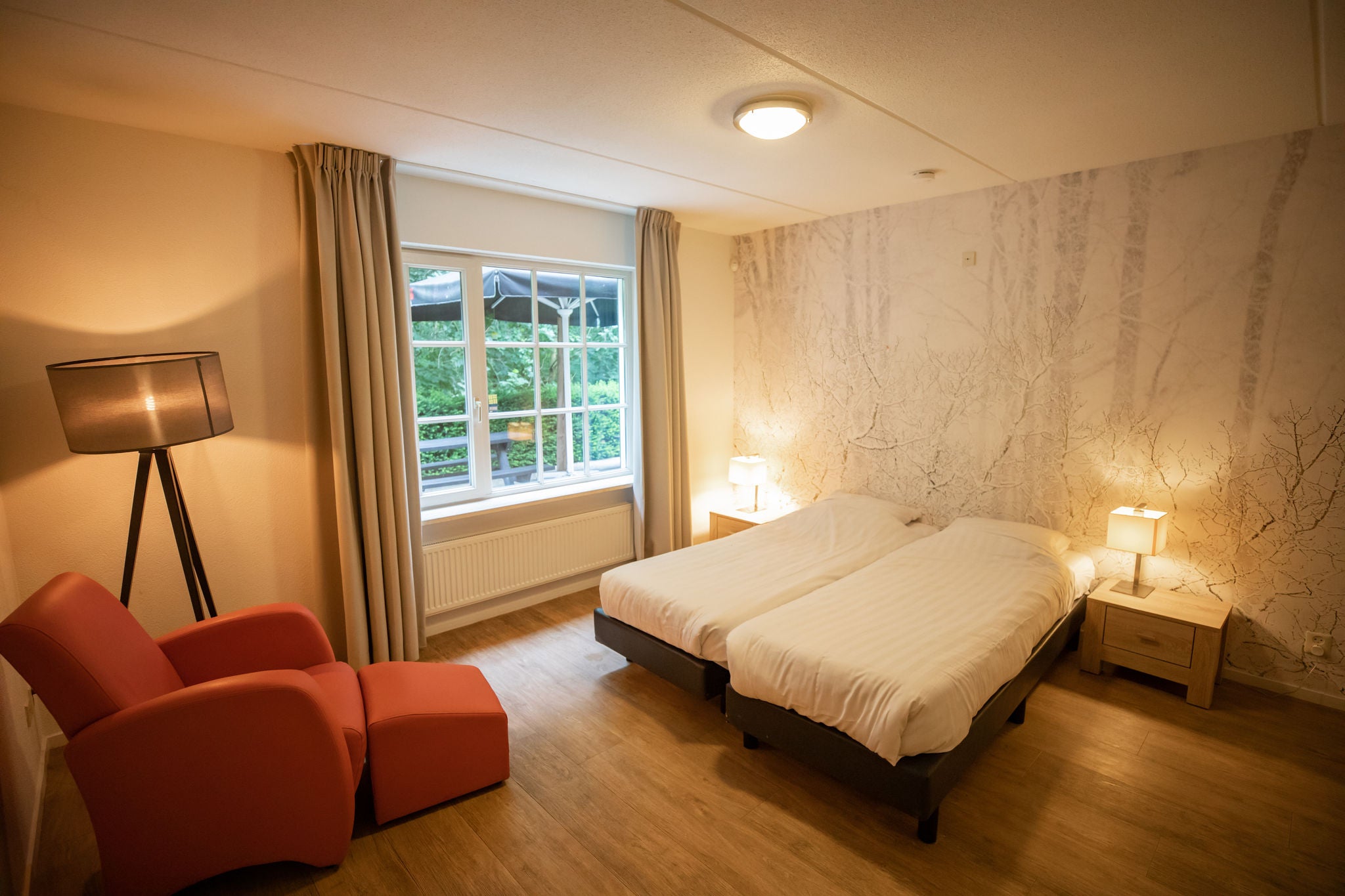 Een slaapkamer in Villa Walibi - 16 personen vakantiehuis